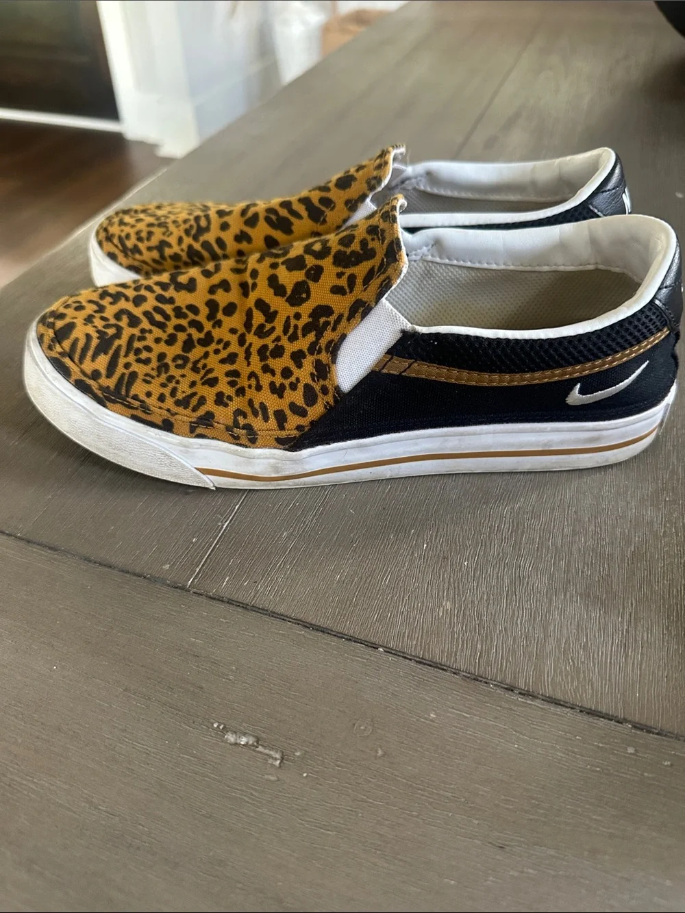 Nike Leopard-Print Slip-On Sneakers in Yellow and Black